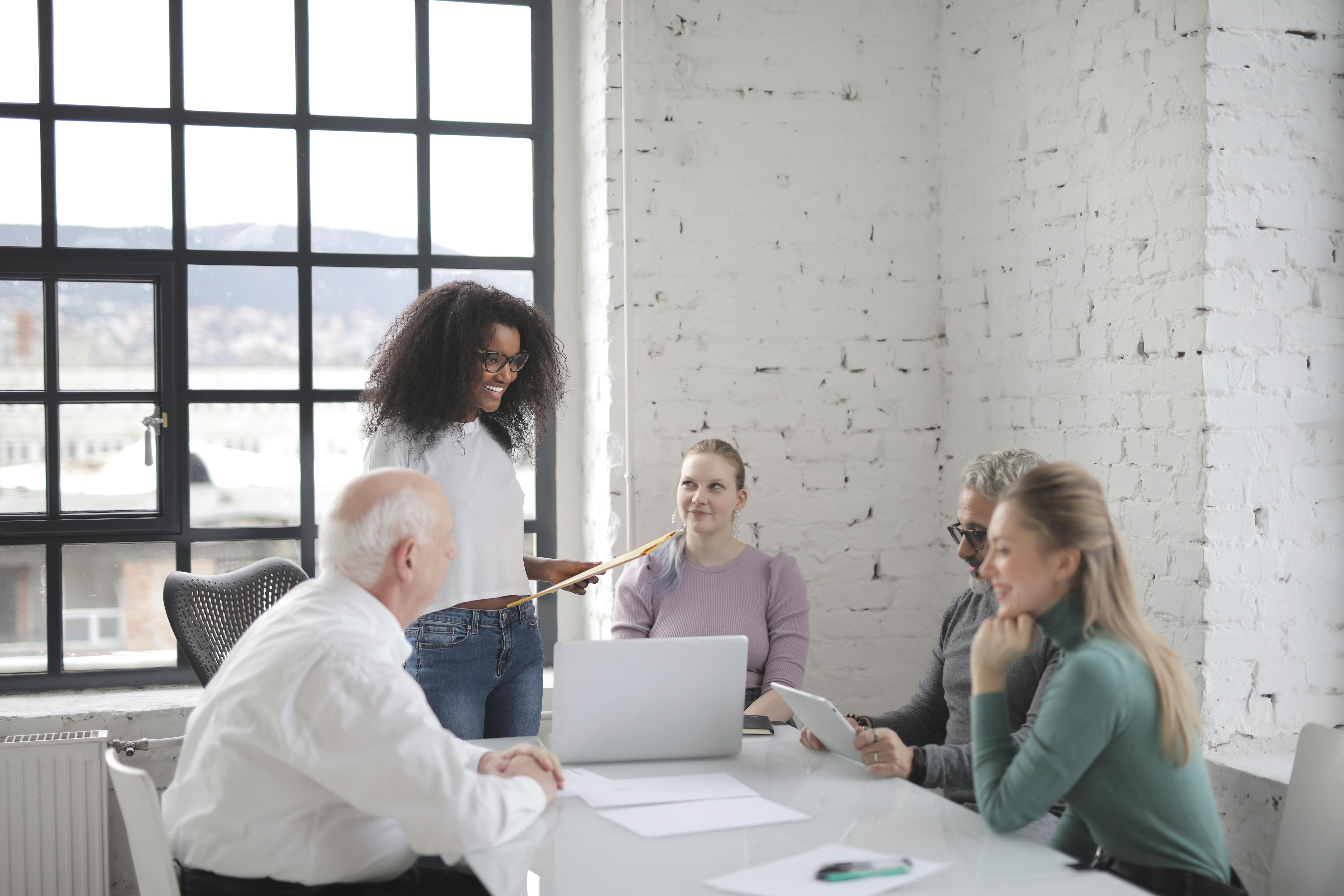 people talking in a meeting